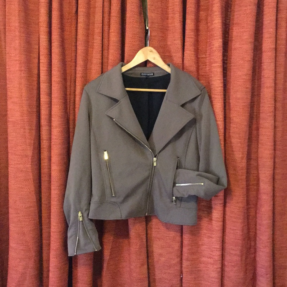 Asymmetric jacket with gold zippers